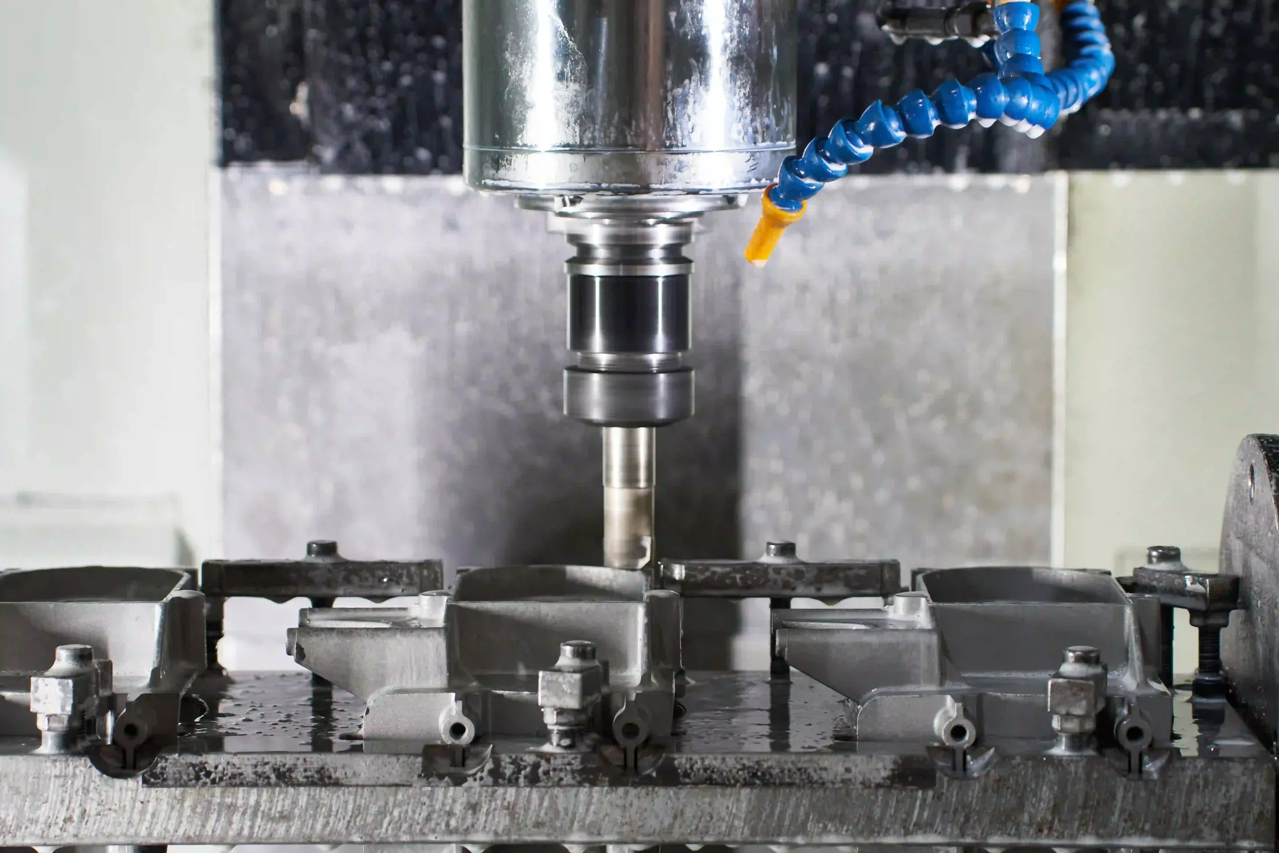 There is semi-finished part is processing in the CNC machine.